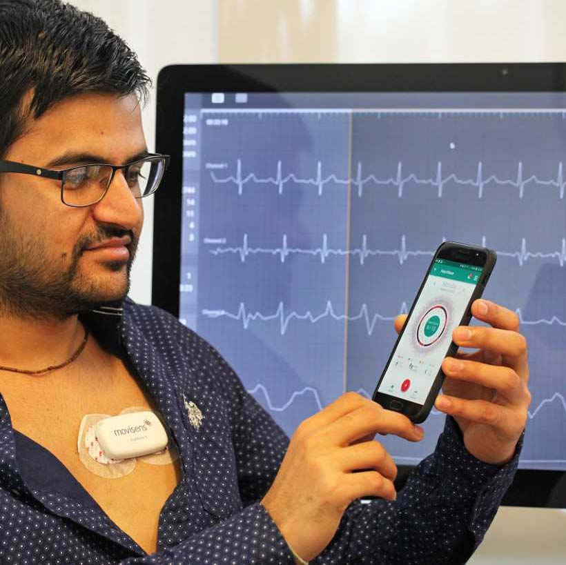 mCardia: A Context-Aware ECG Collection System for Ambulatory Arrhythmia Screening